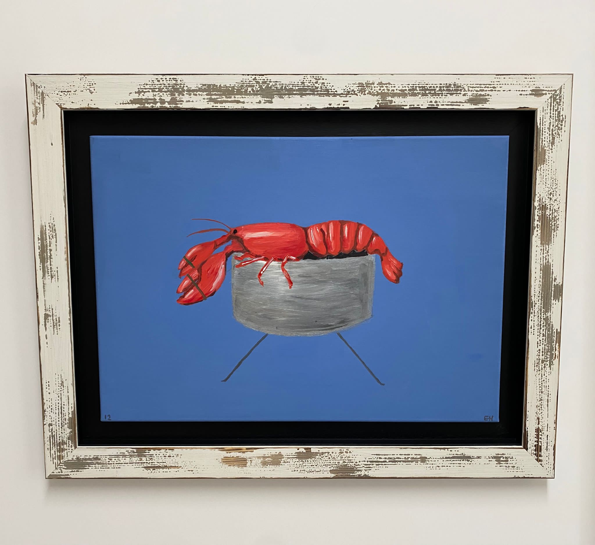 Lobster sitting on a pot